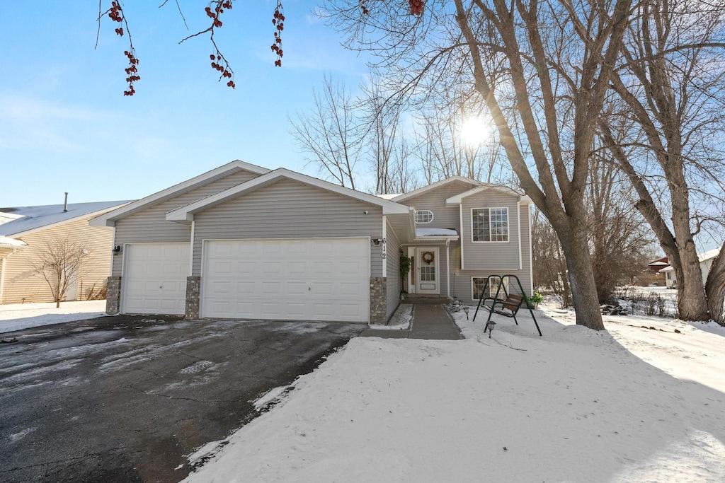 view of front of property featuring a garage