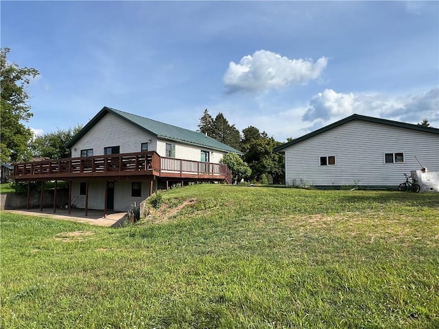 exterior space featuring a patio area and a deck