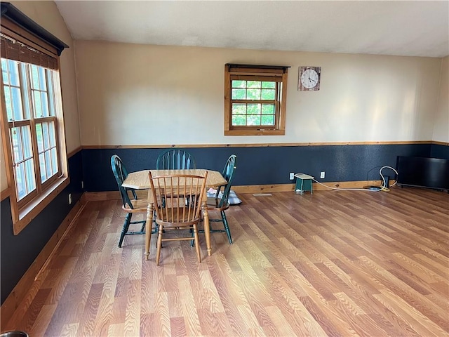 dining room with wood-type flooring