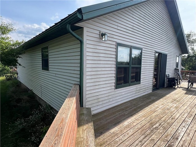 exterior space featuring a wooden deck