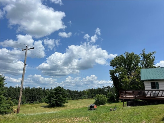 view of yard with a deck