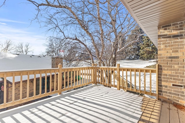 view of snow covered deck