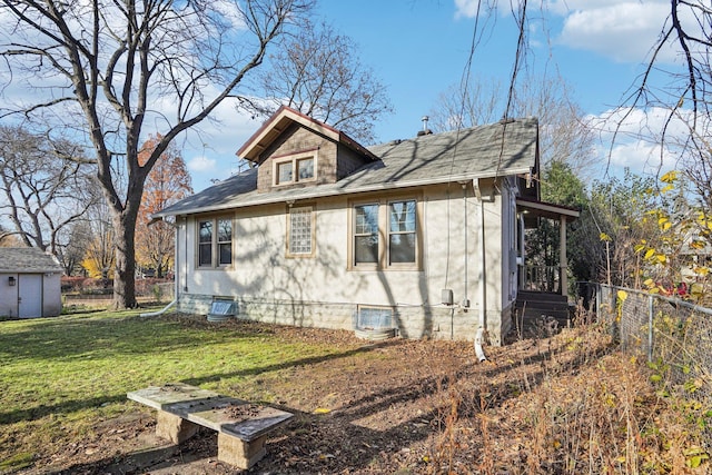 view of home's exterior with a lawn