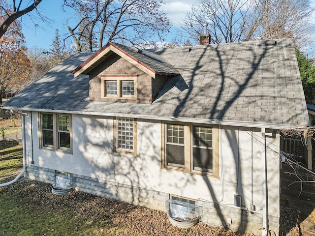 view of home's exterior featuring central AC unit