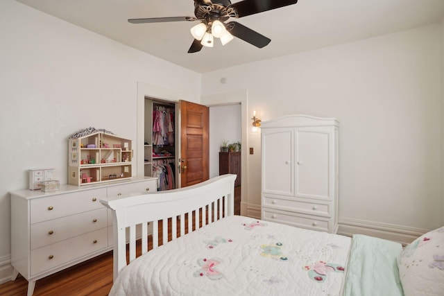 bedroom featuring wood-type flooring and ceiling fan