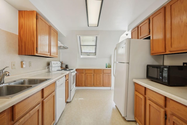 kitchen with sink and white appliances