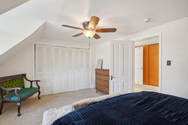 carpeted bedroom with a closet and ceiling fan