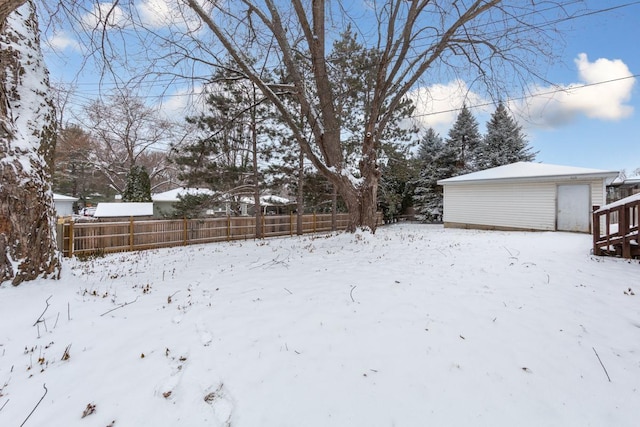 view of yard covered in snow