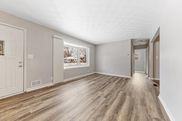 interior space with light hardwood / wood-style floors