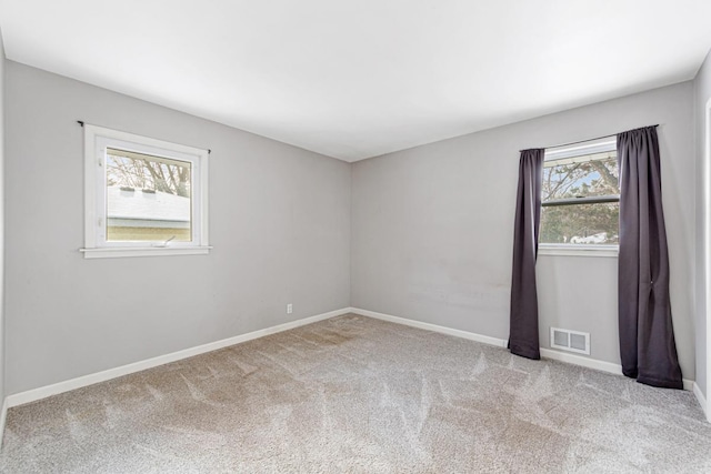 view of carpeted spare room