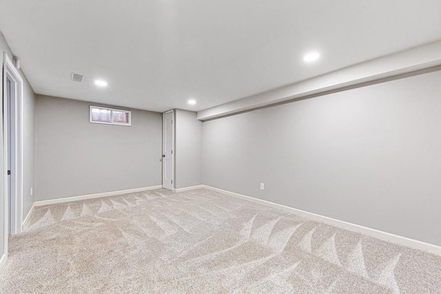 basement with light colored carpet