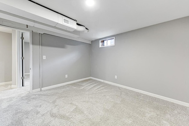 basement with carpet flooring