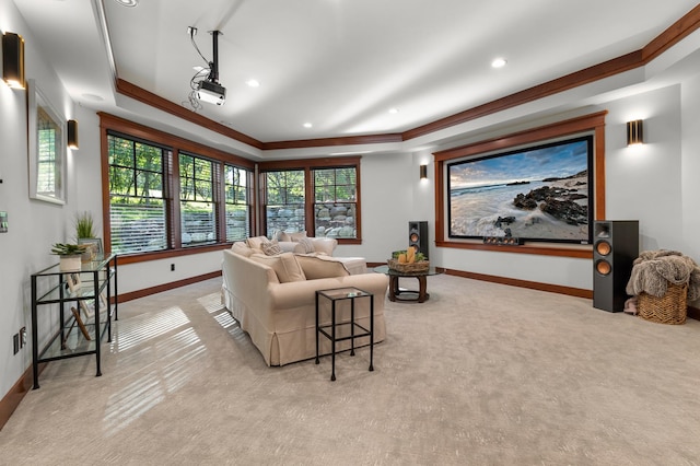 carpeted living room with ornamental molding