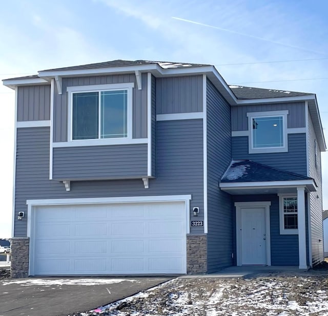 view of front of property featuring a garage