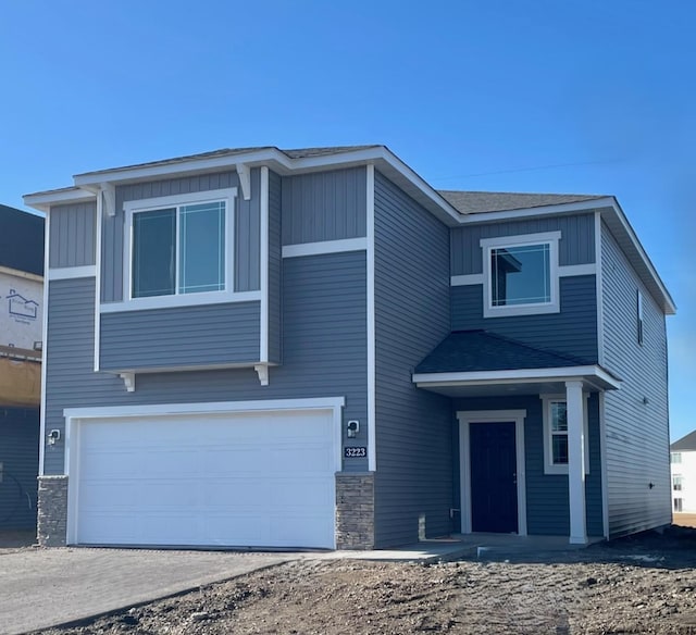 view of front of home featuring a garage