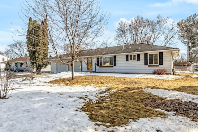 single story home featuring a garage