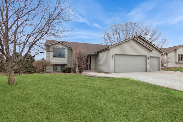 view of front facade with a garage and a front lawn