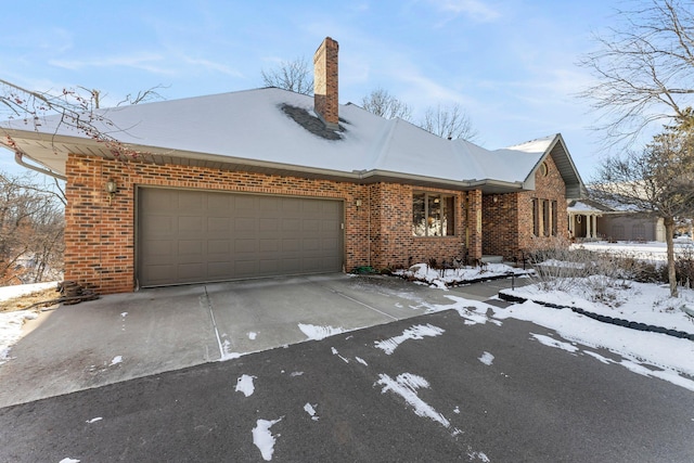 single story home with a garage