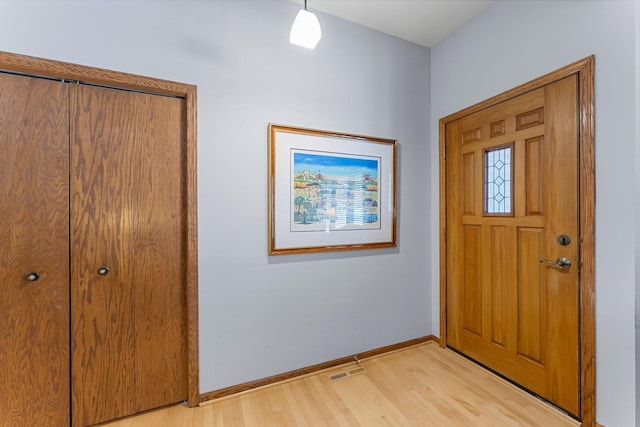 entrance foyer with light wood-type flooring