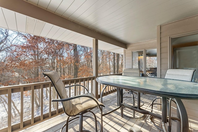 view of snow covered deck