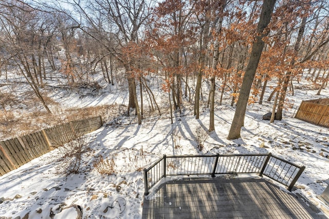 view of snow covered deck