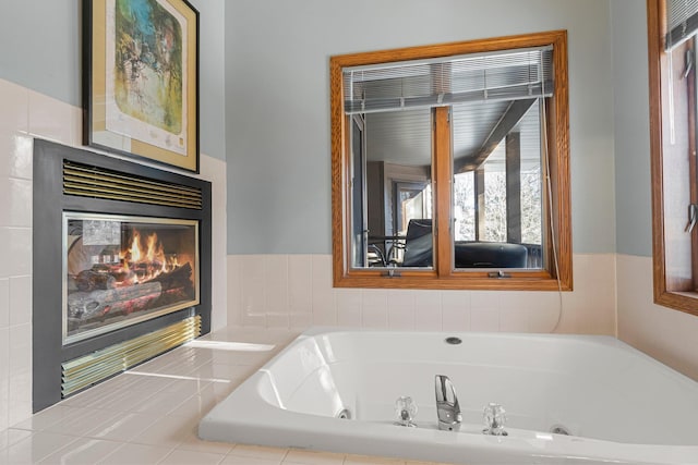 bathroom with tiled tub