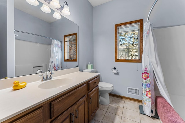 full bathroom with tile patterned flooring, vanity, a notable chandelier, toilet, and shower / bath combo with shower curtain