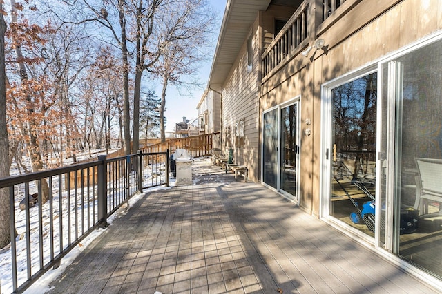 view of snow covered deck