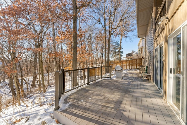 view of snow covered deck