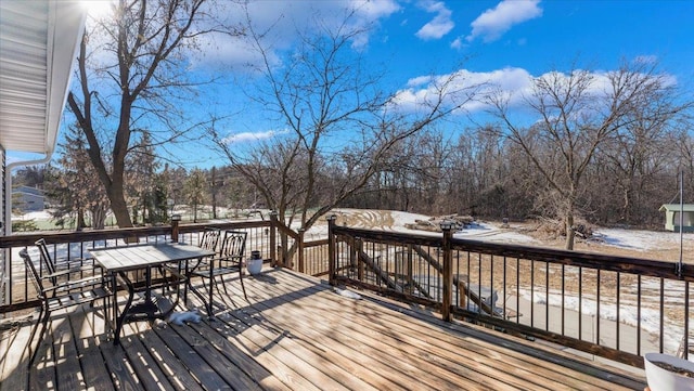 view of snow covered deck