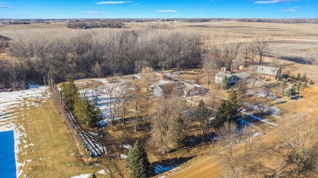 birds eye view of property with a rural view