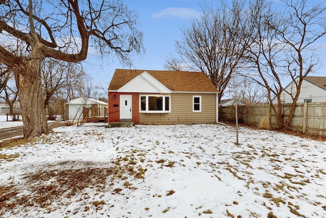 view of snow covered house