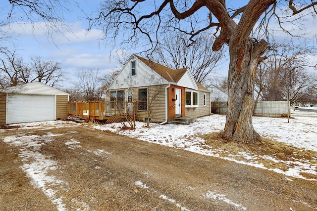 view of front of property with an outbuilding and a garage