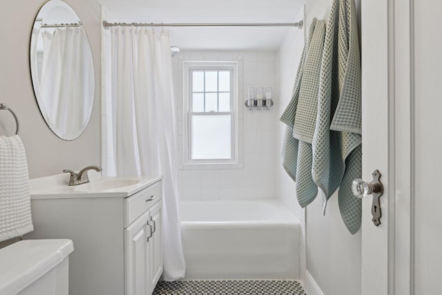 full bathroom with vanity, toilet, and shower / bath combo