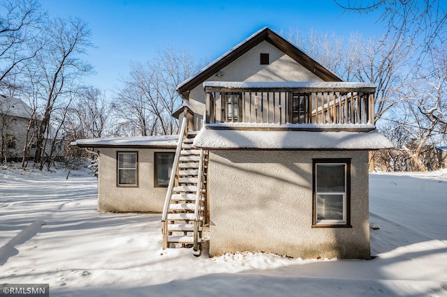 view of snow covered property