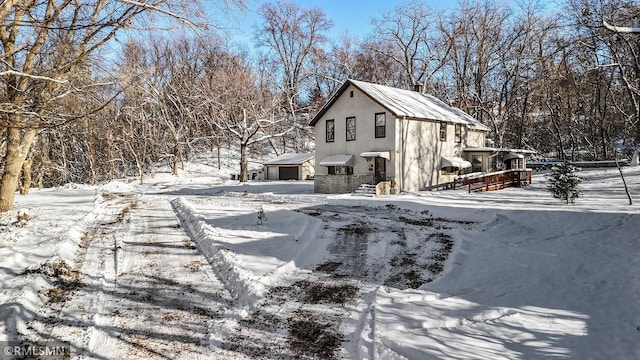 view of snow covered property