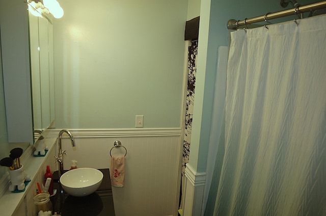 bathroom featuring sink and walk in shower