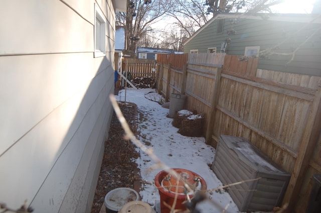 view of yard covered in snow