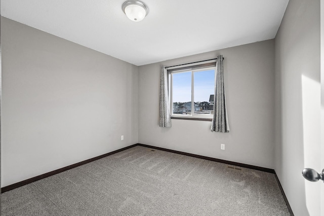 empty room with carpet floors