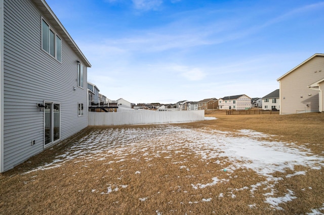 view of yard covered in snow