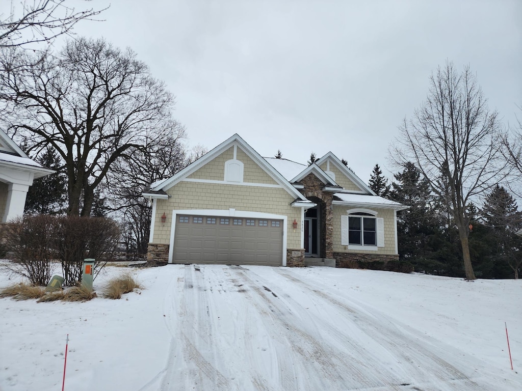 view of front of property with a garage