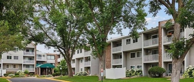 view of building exterior with a residential view