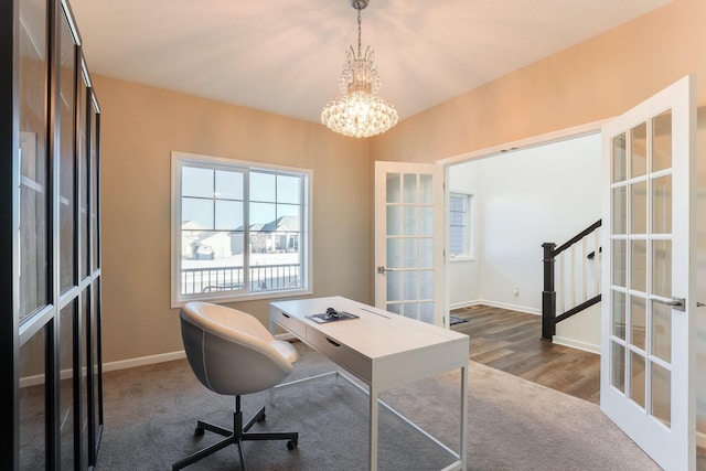 office featuring a chandelier, french doors, baseboards, and wood finished floors