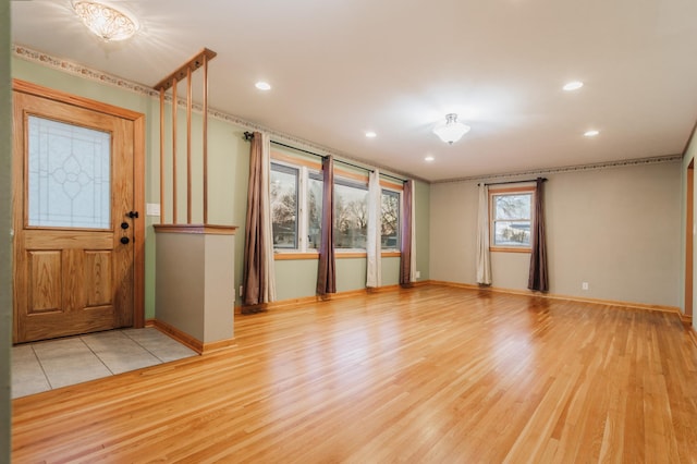 entrance foyer with light hardwood / wood-style floors