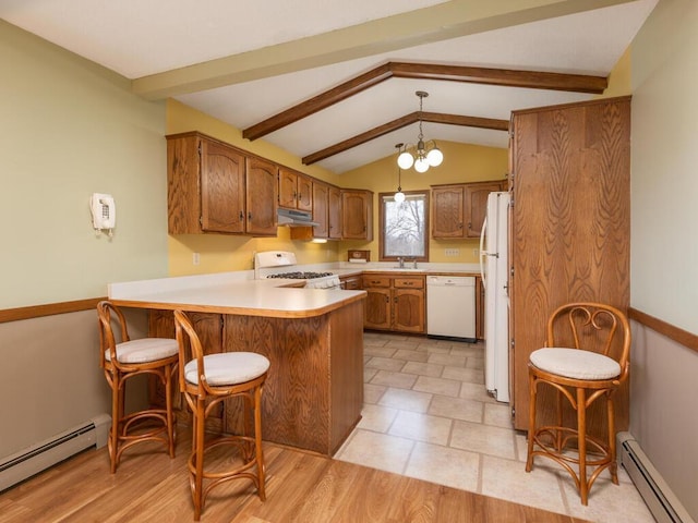 kitchen with pendant lighting, white appliances, kitchen peninsula, and baseboard heating