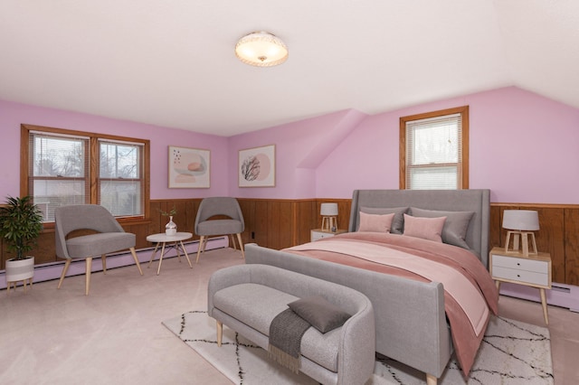 carpeted bedroom with lofted ceiling, a baseboard heating unit, and wood walls