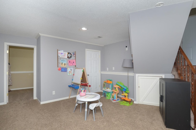 game room featuring baseboards, a textured ceiling, carpet, and recessed lighting