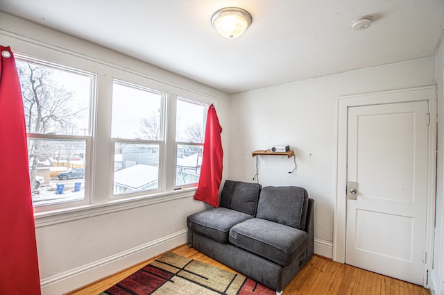 living area with light hardwood / wood-style floors