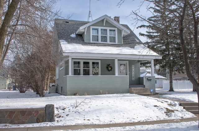 view of front of property featuring covered porch