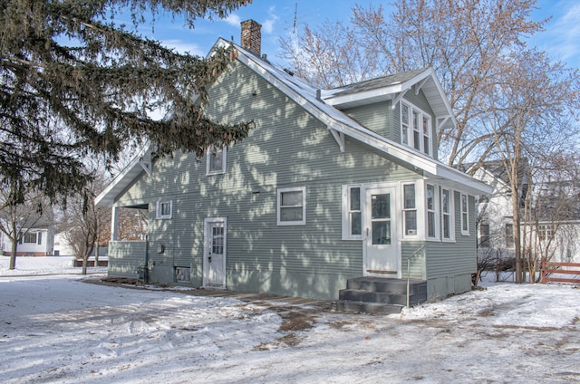 view of snow covered property